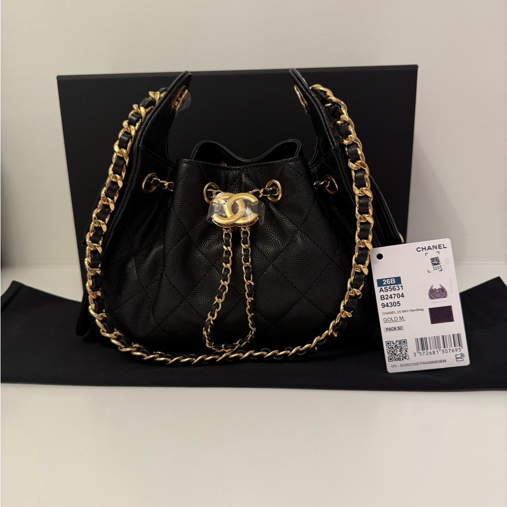 Chanel 25 Mini Quilted Drawstring Shoulder Bag in Black Caviar with Gold Chain